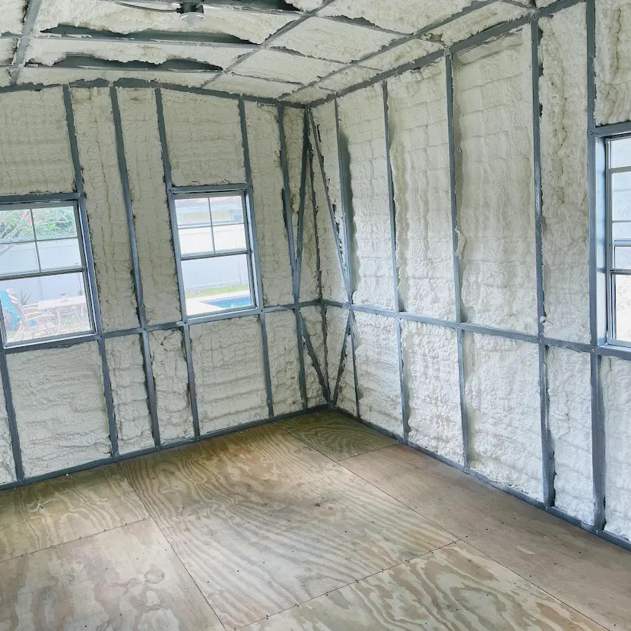 Closed-cell spray foam insulation applied to wall cavities in a residential project in Colts Neck